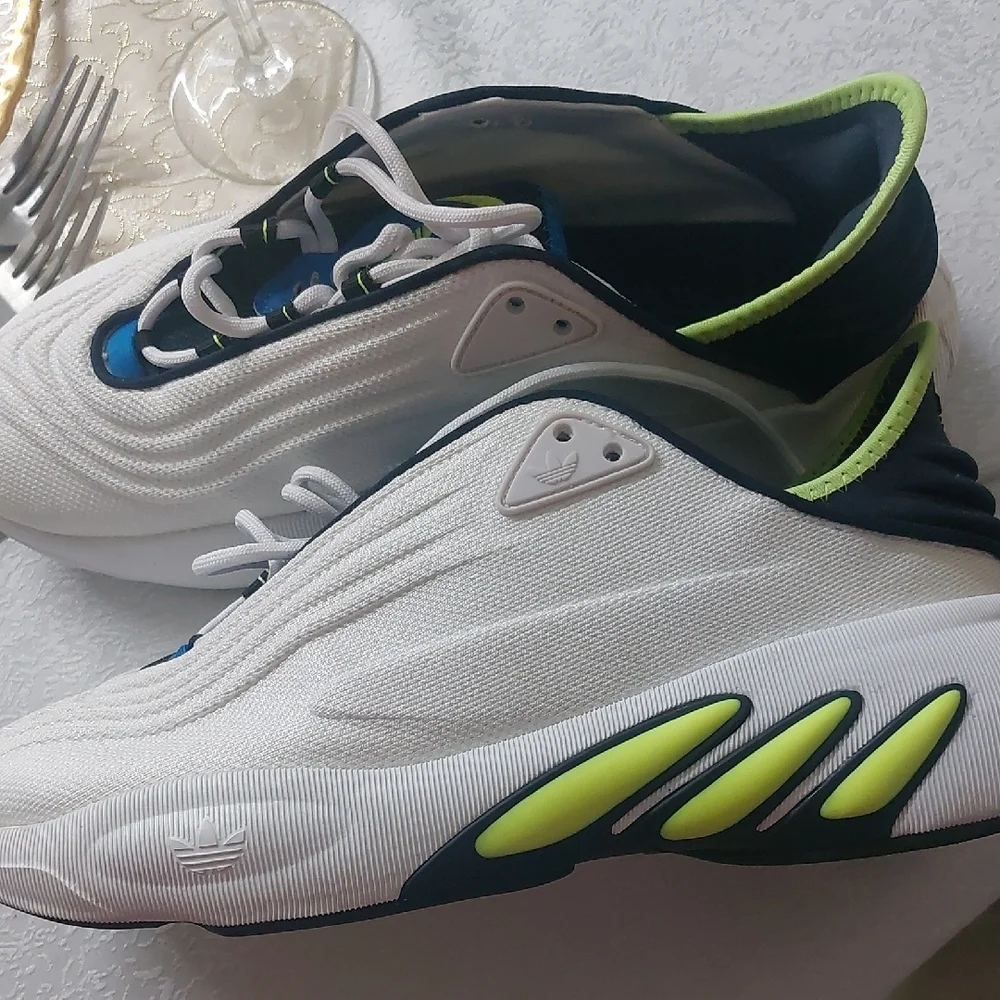 Adidas Adifom SLTN shoes in the Cloud White / SolarYellow / Blue Colorway